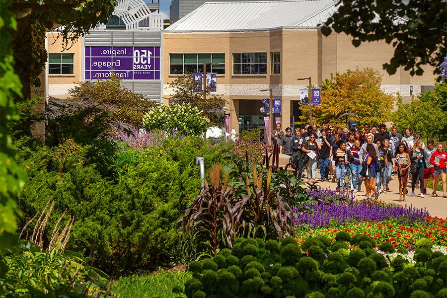 A Hawk Squad member leads a campus tour.